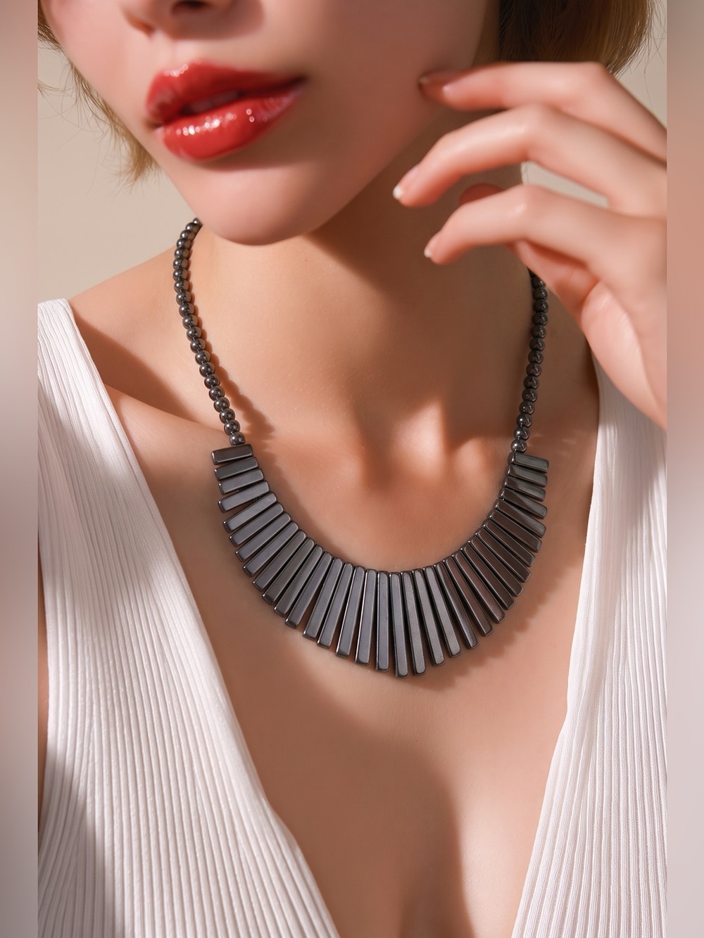 hematite fringe bib statement necklace and matching geometric drop earrings